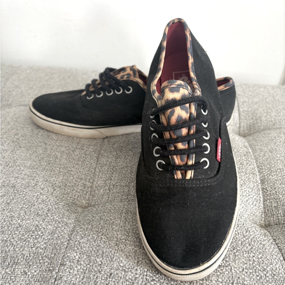 Women’s size 7.5 black and leopard vans sneakers.